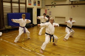 Harry working with the Black belts to improve his Kata